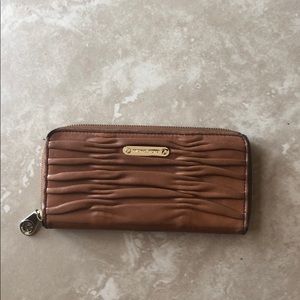 Michael Kors Tan leather zip around wallet